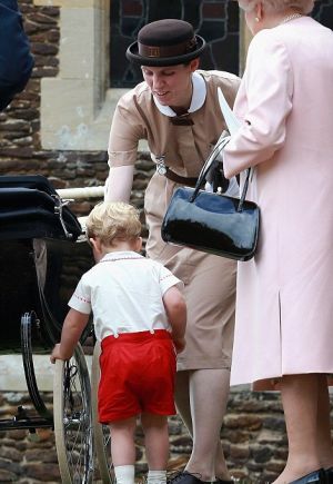 Nanny Maria Borrallo in her Norland nanny uniform with Prince George.jpg